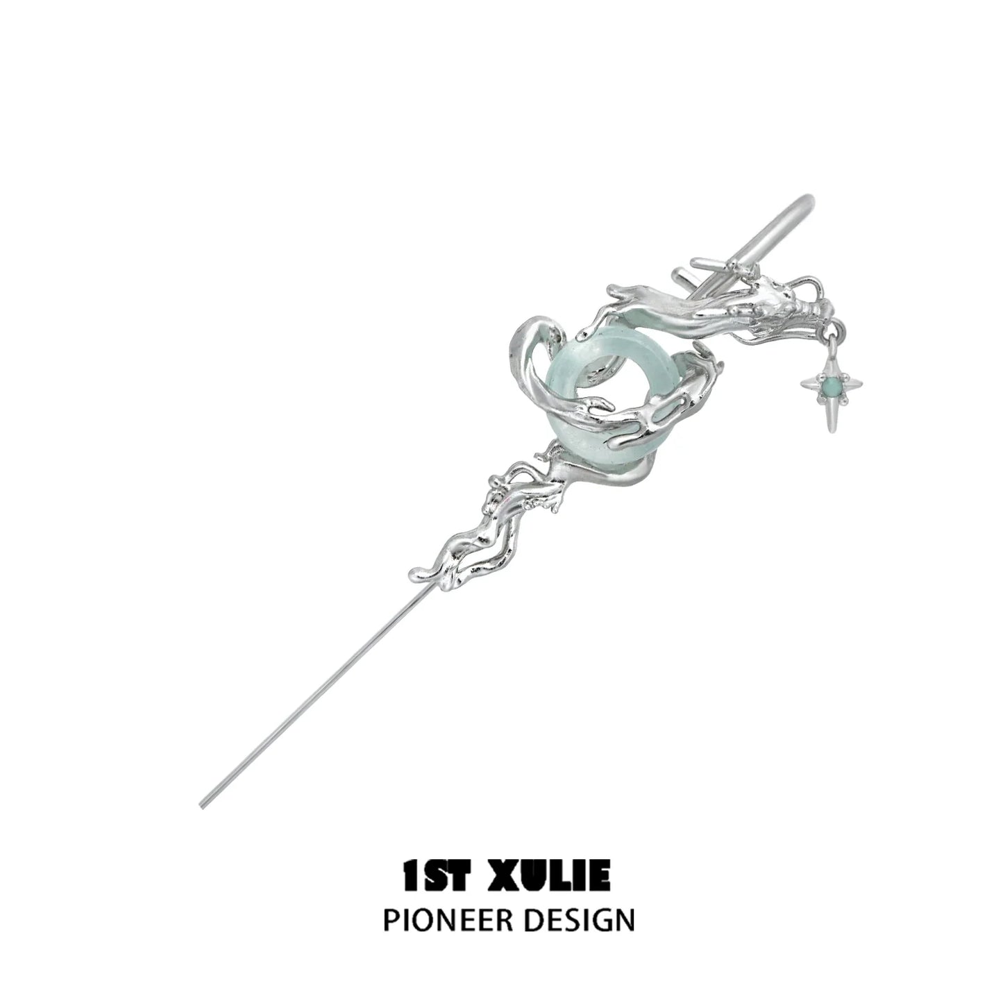 Unique silver dragon ear piercing with intricate details and a gemstone accent for a stylish look