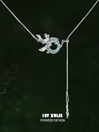Elegant silver iris pull buckle necklace with floral design and adjustable chain for stylish looks