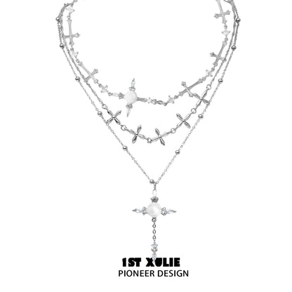 Elegant silver rose cross necklace with layered design and decorative accents