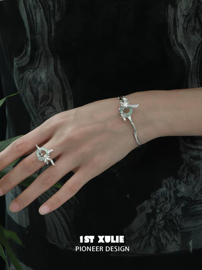 Elegant silver safety buckle bracelet with floral design, perfect for daily wear or special occasions
