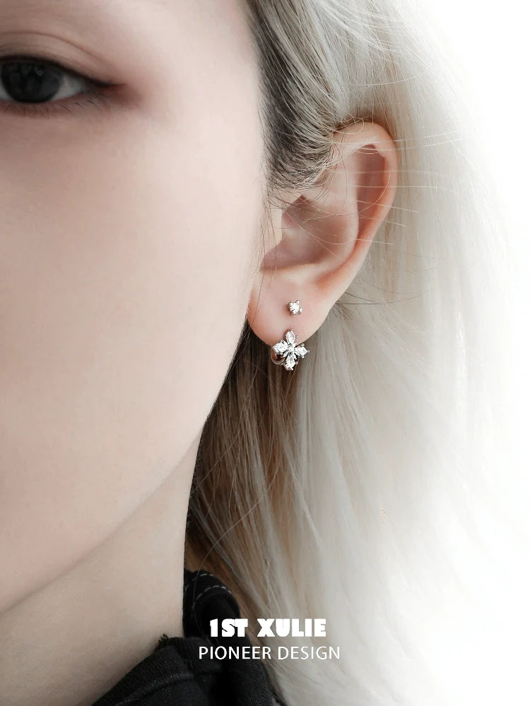 Stylish silver star earrings featuring a delicate star design for a chic look