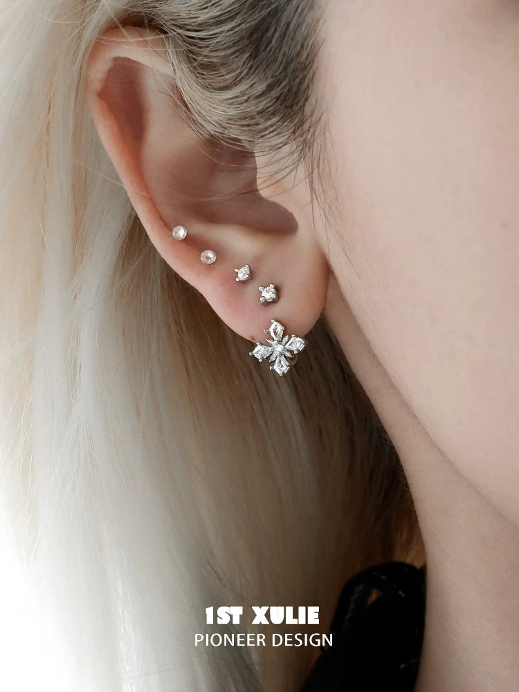 Elegant silver star earrings featuring a unique design perfect for everyday wear
