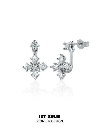 Elegant silver star earrings with sparkling gemstones in a chic design for stylish outfits