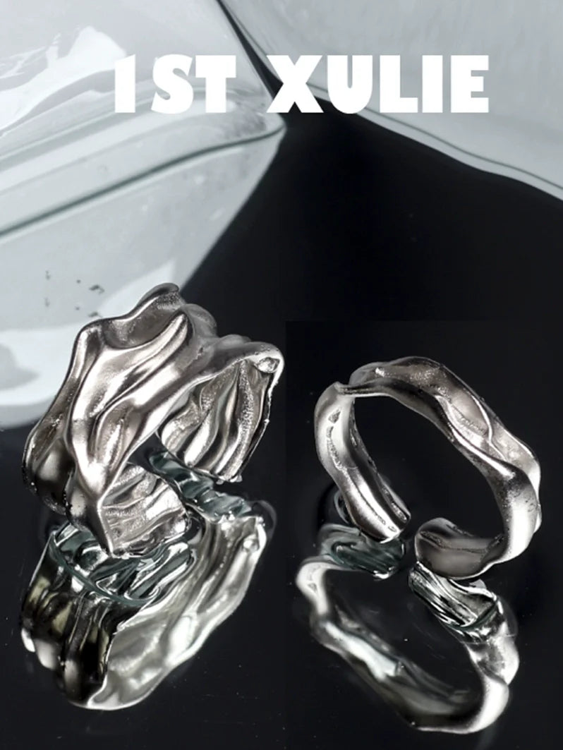 1ST XULIE unique silver statement ring with a wave-like design and polished finish
