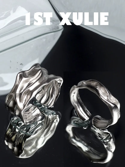 1ST XULIE unique silver statement ring with a wave-like design and polished finish