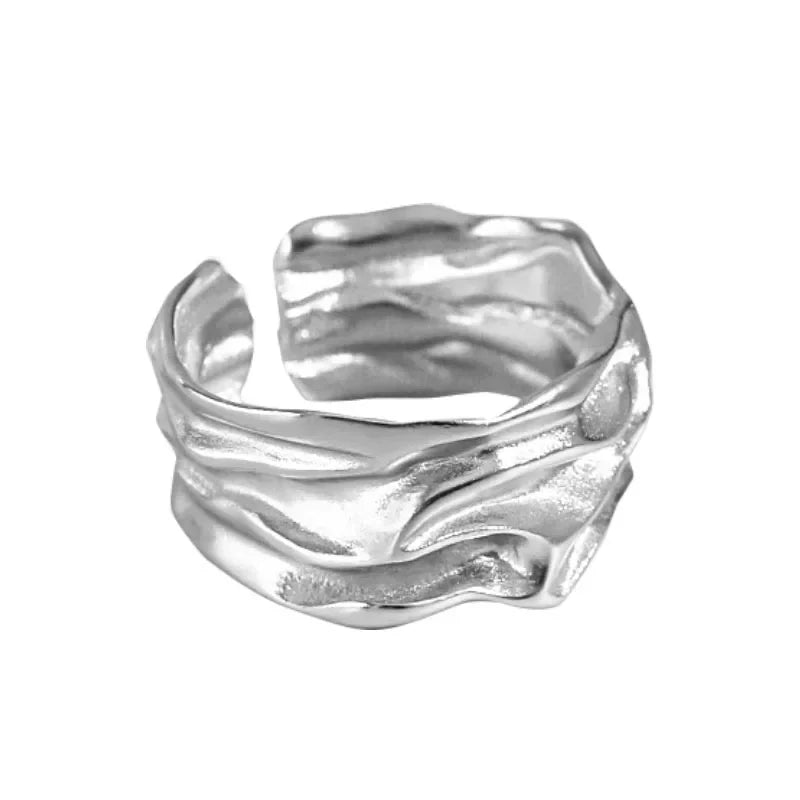 Textured silver statement ring with a modern design, perfect for stylish accessories