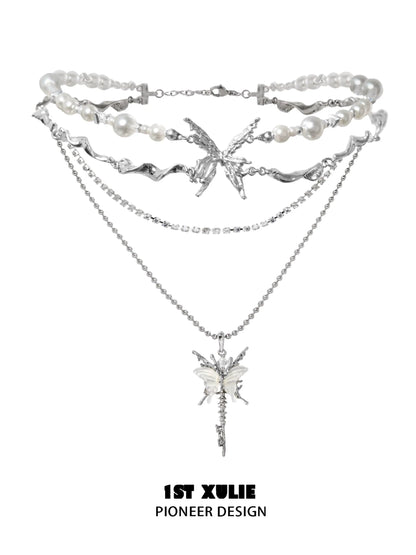 Skeleton butterfly pearl necklace with layered silver chains and elegant pearl accents