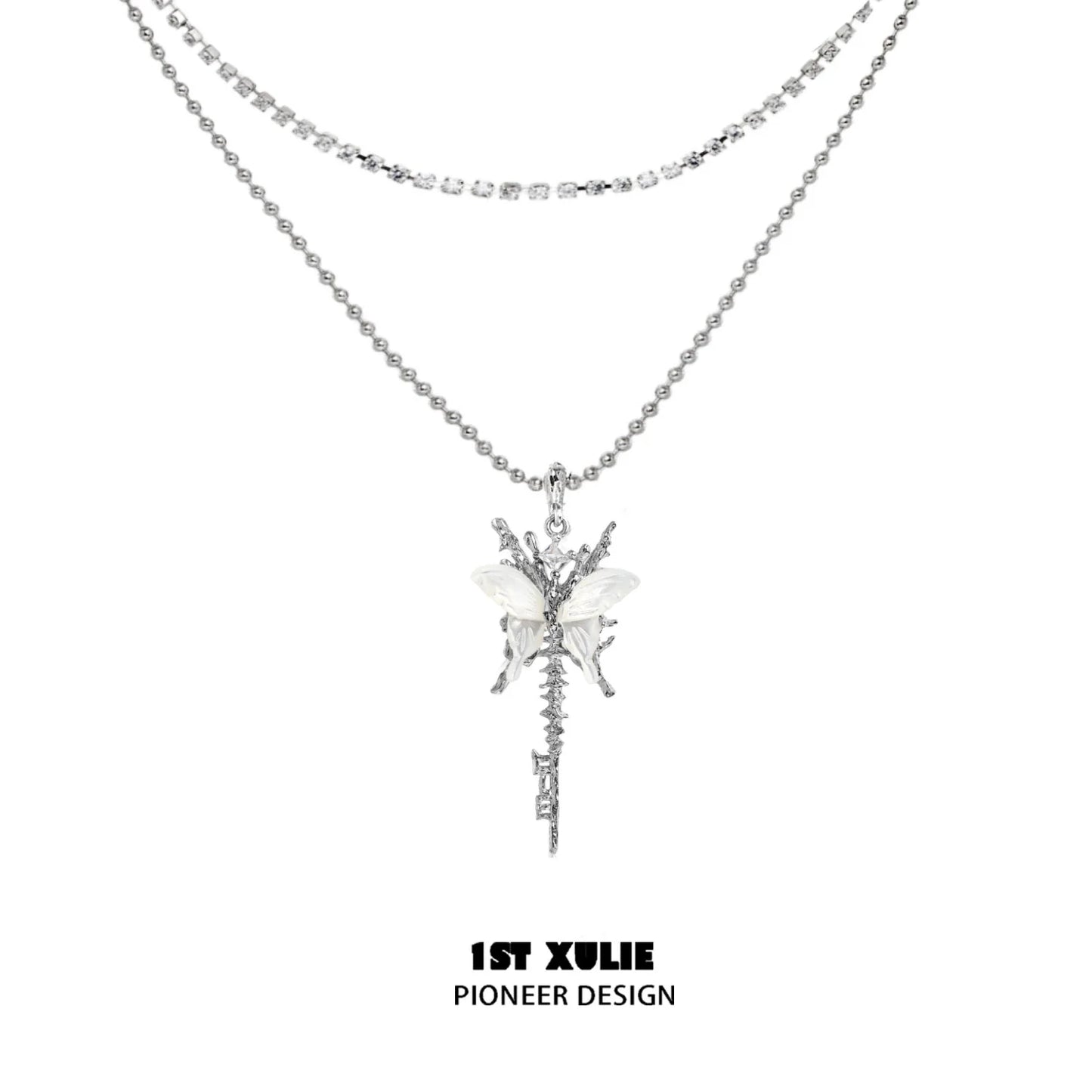 Skeleton butterfly pearl necklace by 1STXULIE featuring layered silver design with elegant embellishments