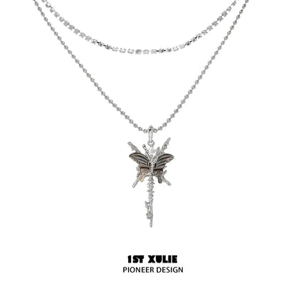 Skeleton butterfly pearl necklace with layered silver chains and intricate design for stylish elegance