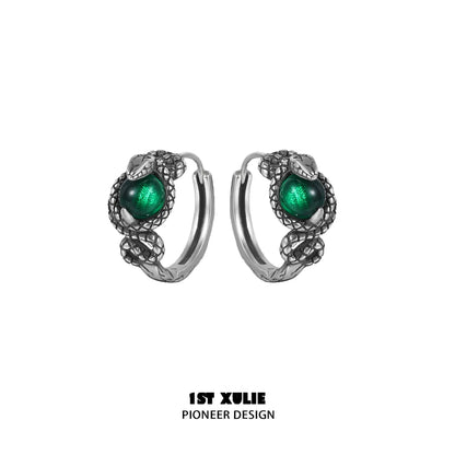 Slytherin fang earrings featuring a green gemstone and snake design for a stylish look