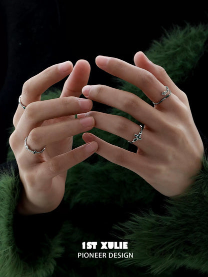 Two stylish Slytherin snake couple rings on fingers showcasing unique design and craftsmanship