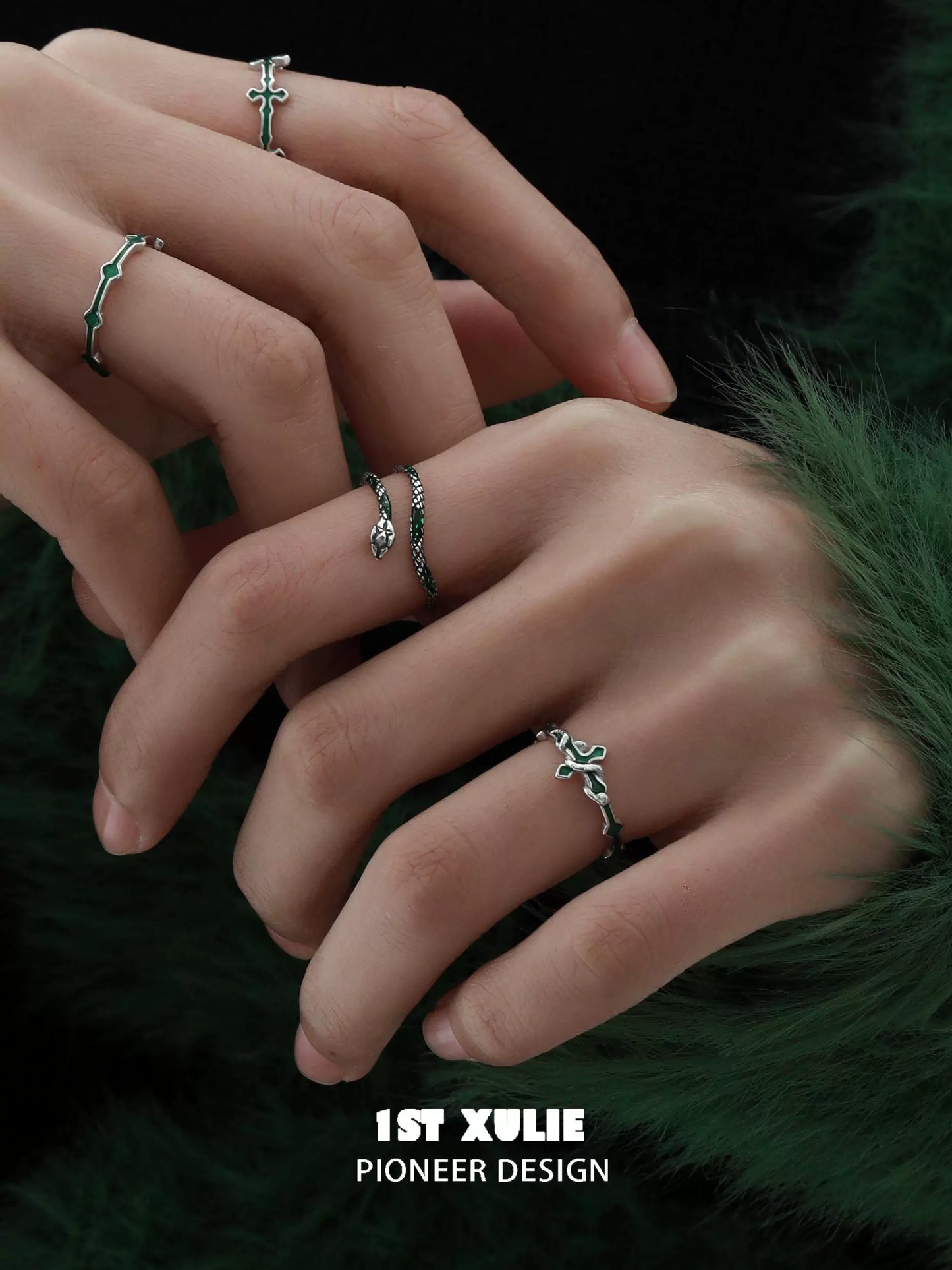 Elegant Slytherin snake couple rings displayed on hands, showcasing intricate designs and craftsmanship
