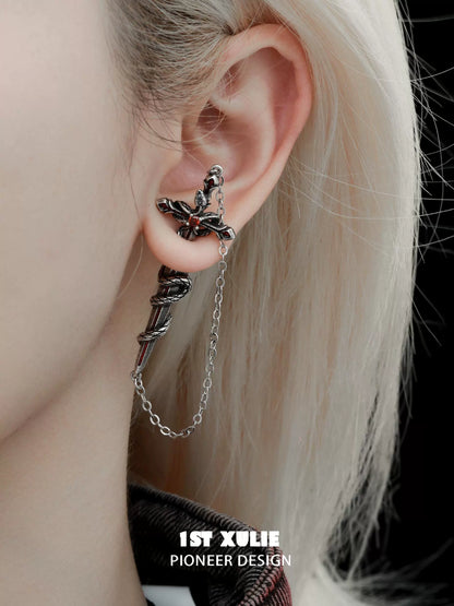 Stylish Slytherin snake earrings featuring chain detail for a unique look