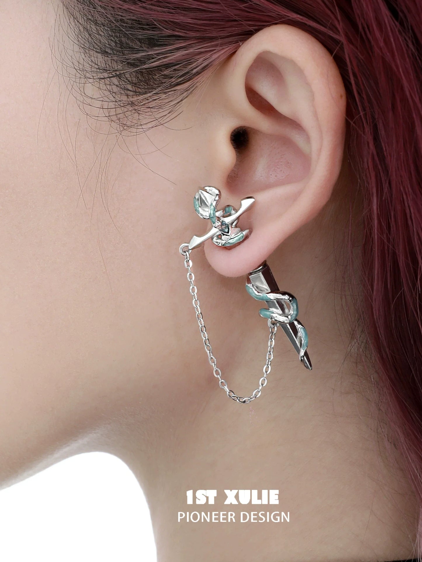 1ST XULIE Snake Chain Piercing Earrings featuring a unique design with a stylish chain link