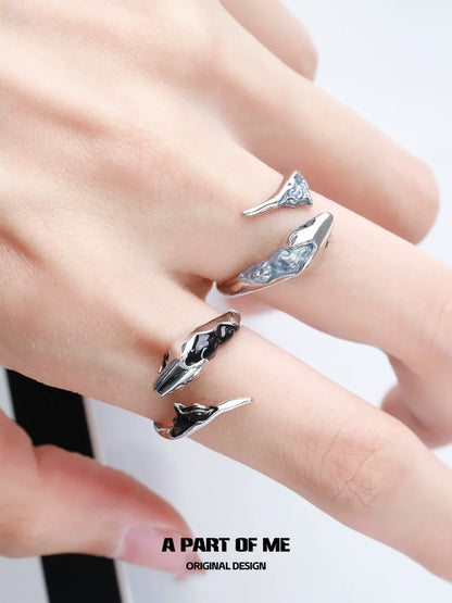 A Part of Me snake couple rings in silver and black design for a stylish connection between partners