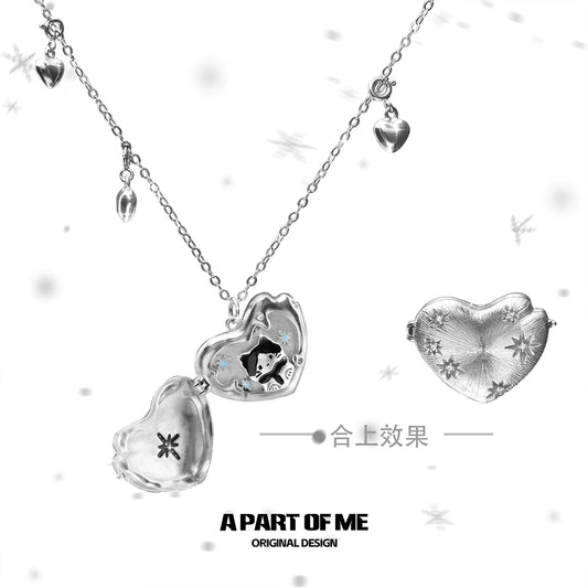 A PART OF ME snow kitten love pendant necklace featuring heart-shaped design with shimmering details