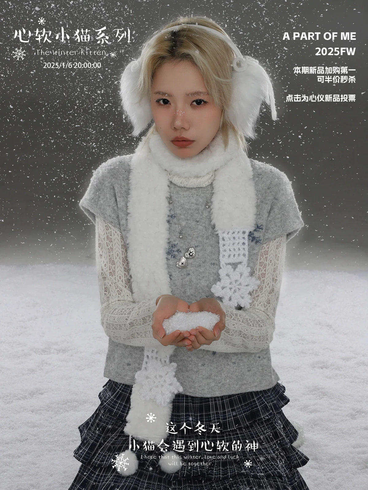 A PART OF ME snow kitten love pendant necklace showcased on a model wearing winter attire