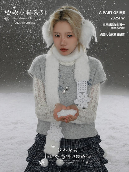 A PART OF ME snow kitten love pendant necklace showcased on a model wearing winter attire