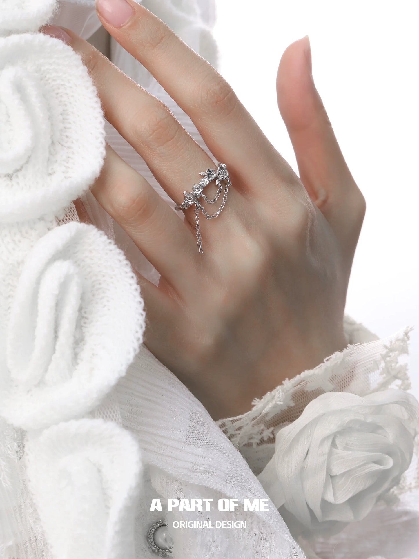 Elegant A PART OF ME snow rose chain ring featuring delicate floral design and shimmering details