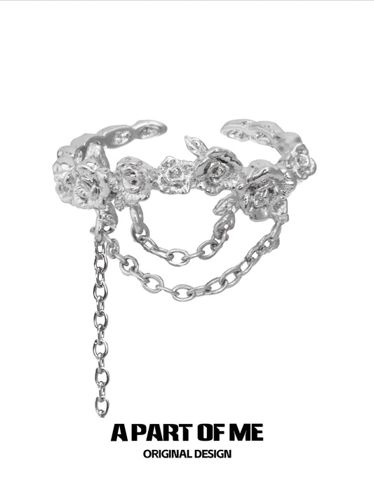 A PART OF ME snow rose chain ring in silver featuring floral designs and a delicate chain accent