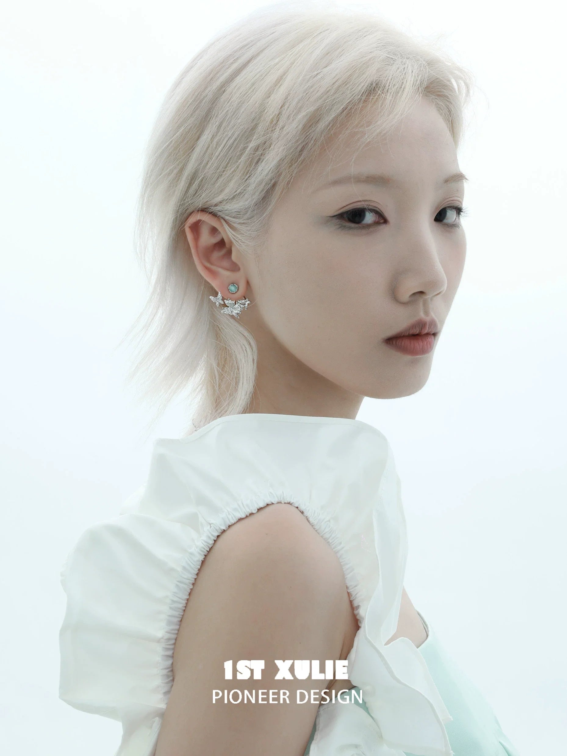 1STXULIE Snowflake Butterfly Earrings showcased on a model for elegant styling