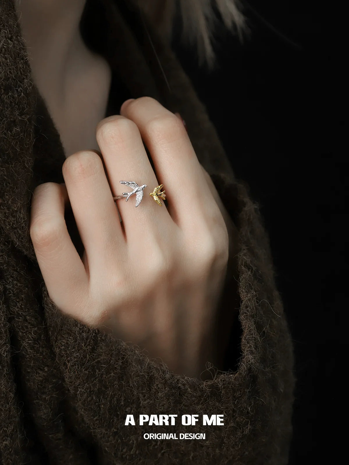 Elegant soaring birds ring in silver and gold, perfect for adding a unique touch to any outfit