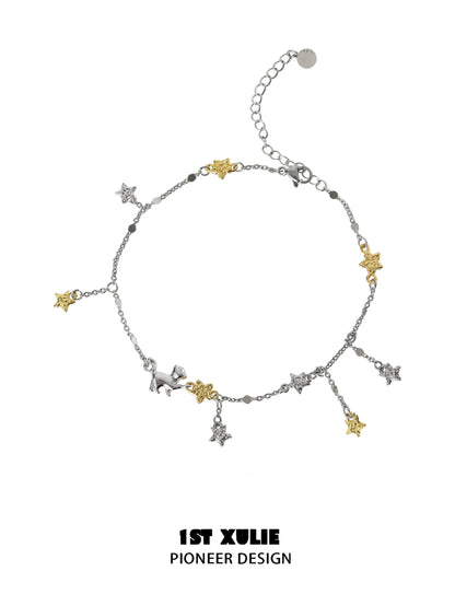 Star picking cat silver anklet with gold and silver star charms for a whimsical accessory