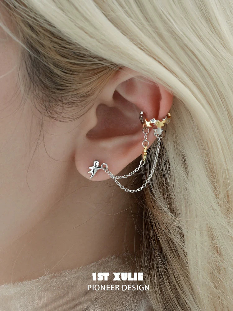 Stylish 1STXULIE starlight ear cuff featuring delicate chains and star accents for a trendy look