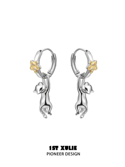 Starlit cat silver earrings with a playful cat design and yellow star accents