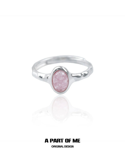 A PART OF ME strawberry stone silver ring with a polished finish and oval stone design