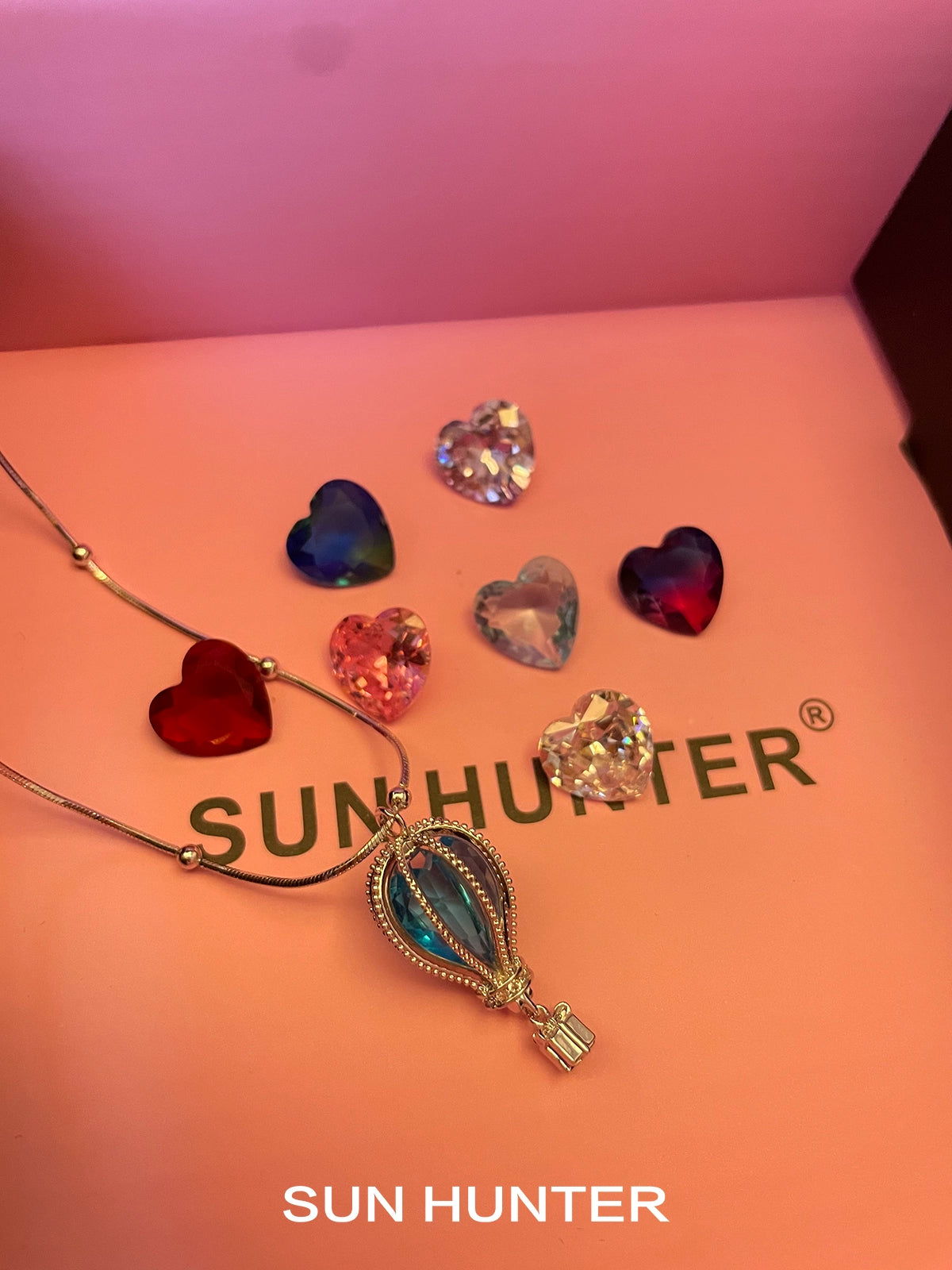 Sun Hunter Jewelry colorful balloon zircon necklace for women displayed with heart-shaped embellishments