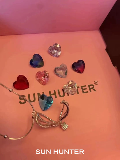 SUN HUNTER Jewelry colorful balloon zircon necklace for women with heart-shaped stones on a pink background