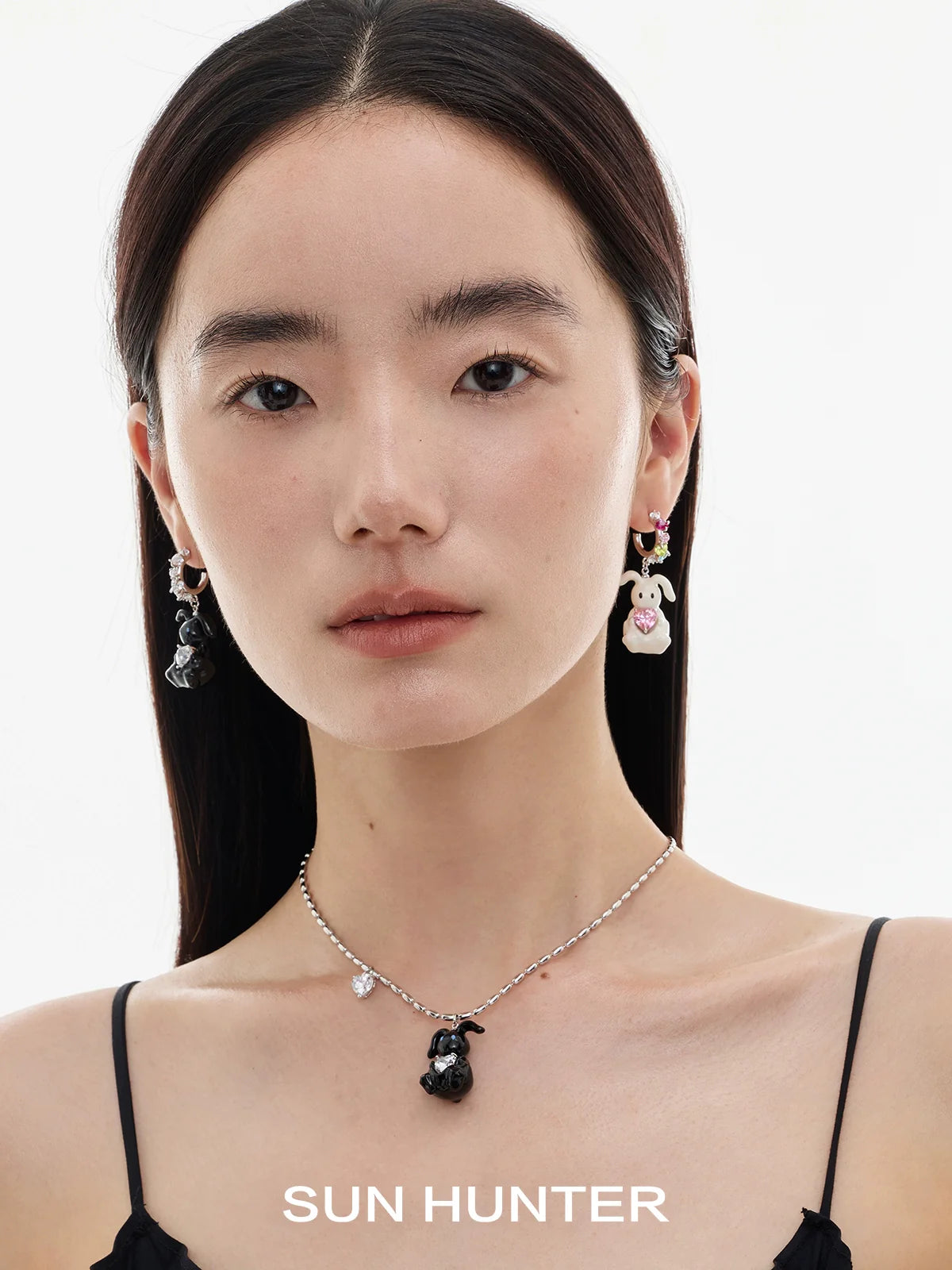 Sun Hunter jewelry cute rabbit necklace for women layered with matching earrings in a stylish display