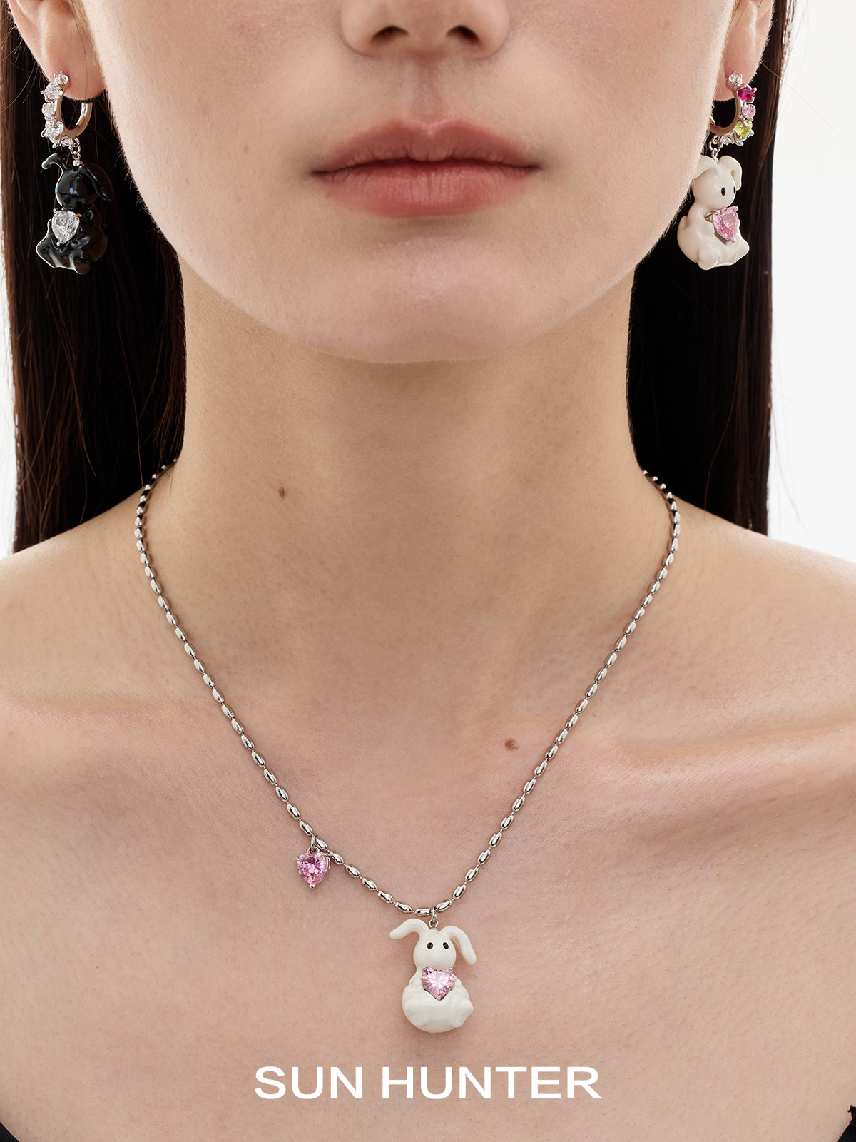 Sun Hunter jewelry cute rabbit necklace for women displayed on a model with matching earrings