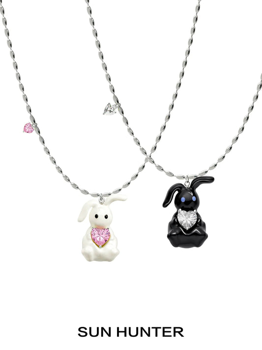 Sun Hunter jewelry cute rabbit necklace for women featuring black and white bunnies with heart charms