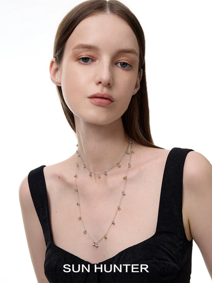 SUN HUNTER jewelry golden bell pendant necklace for women displayed elegantly on model