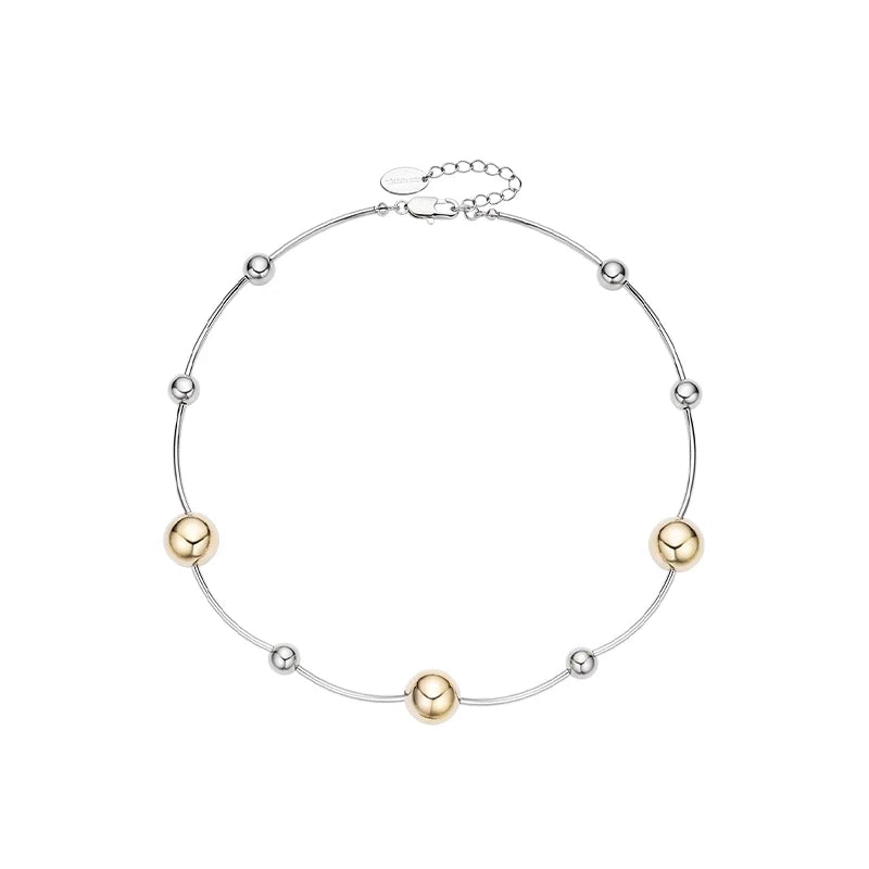 Sun Hunter jewelry planet silver necklace for women with a mix of silver and gold beads