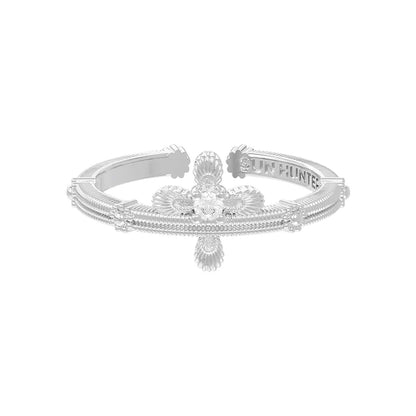 SUN HUNTER lace cross ring in silver with intricate design and sparkling gemstone centerpiece