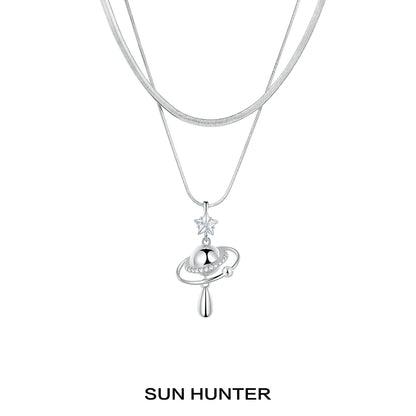 Sun Hunter universe planet silver necklace with star charm and elegant design for space lovers