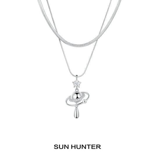 Sun Hunter universe planet silver necklace with star charm and elegant design for space lovers