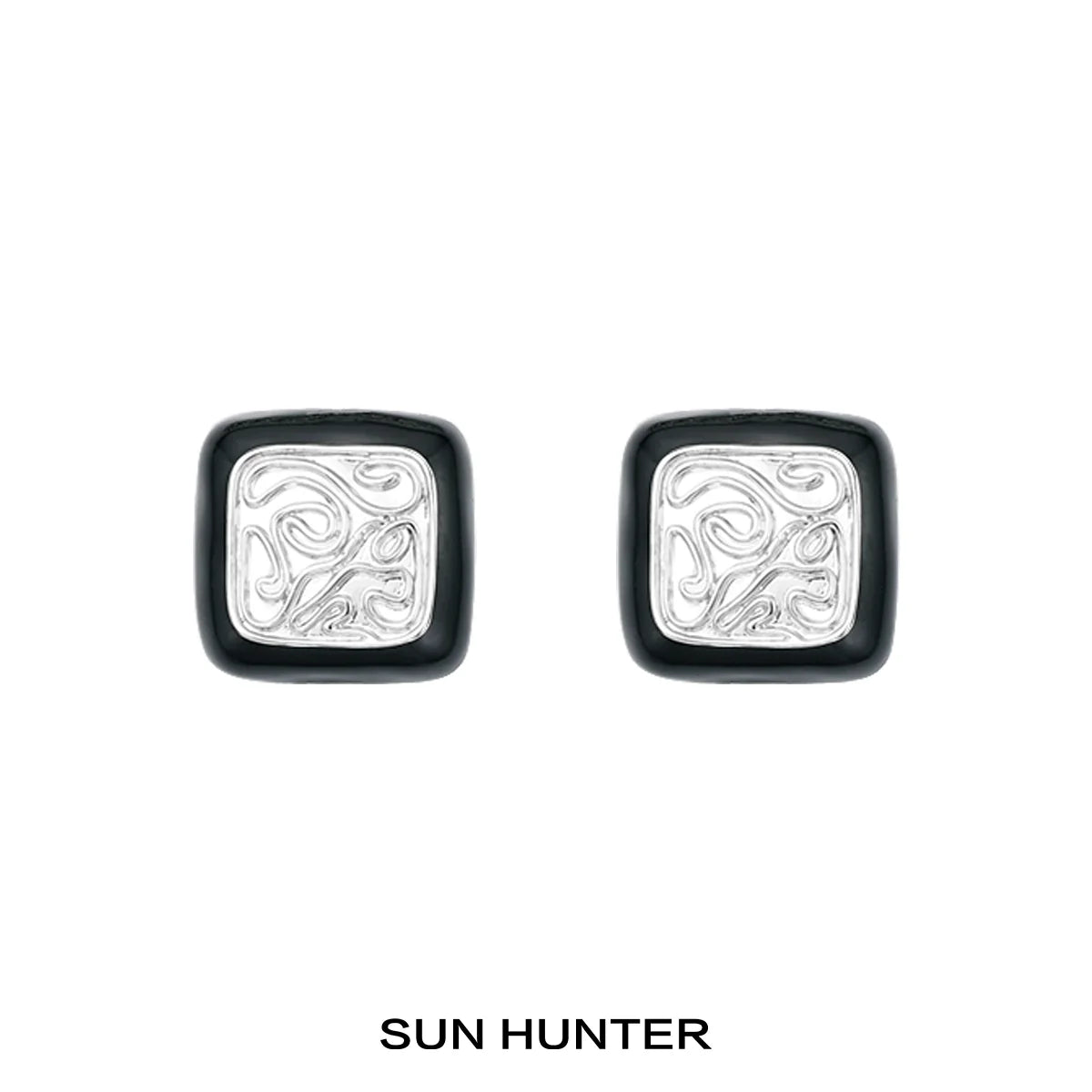 Vintage coin stud earrings by SUN HUNTER with intricate swirl design and a classic square shape