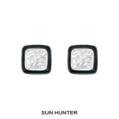 Vintage coin stud earrings by SUN HUNTER with intricate swirl design and a classic square shape