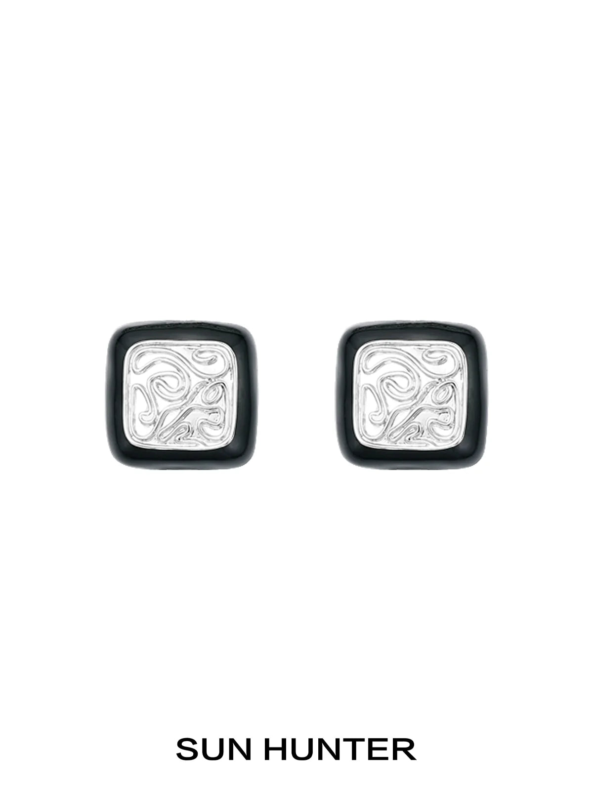 Elegant vintage coin stud earrings by SUN HUNTER with intricate silver designs and a classic look