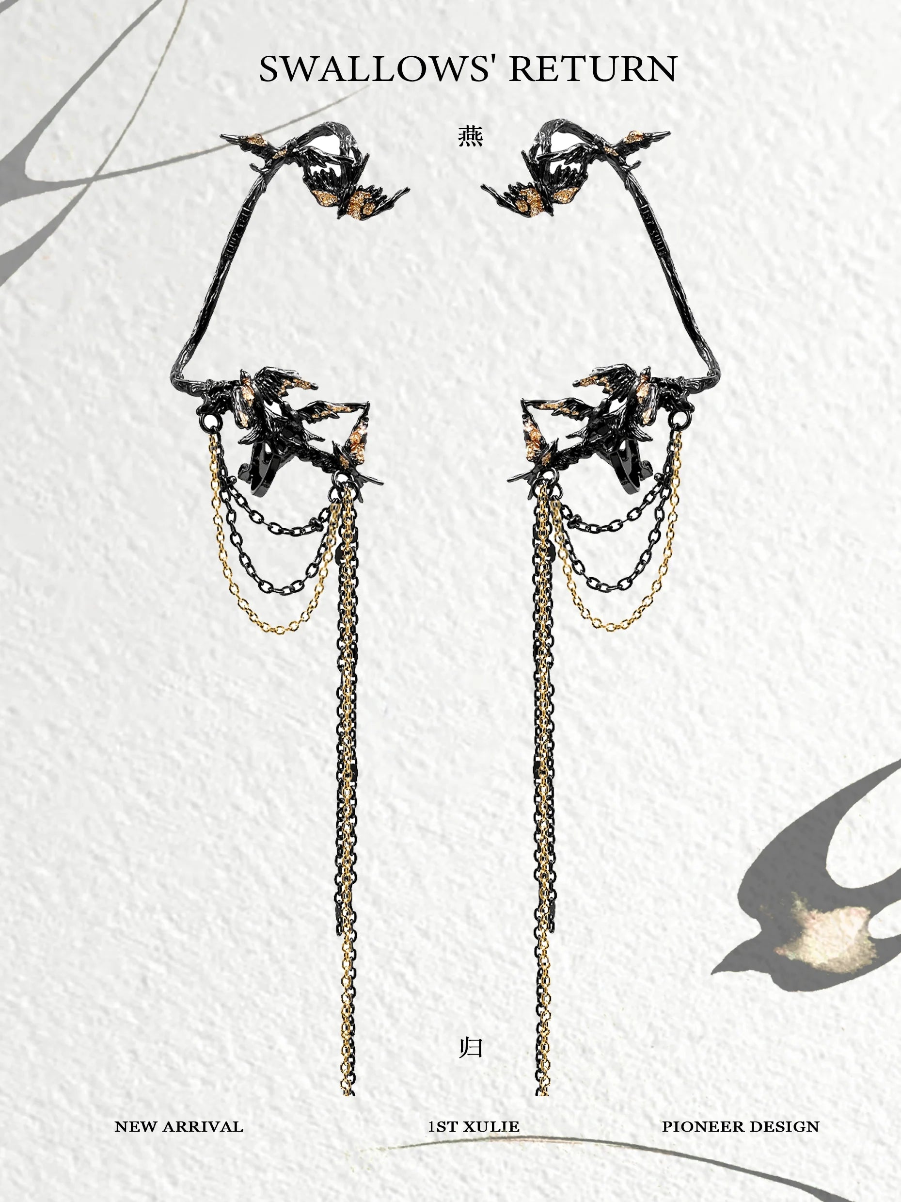 Elegant swallow ear clips featuring intricate design and chains for a unique accessory look