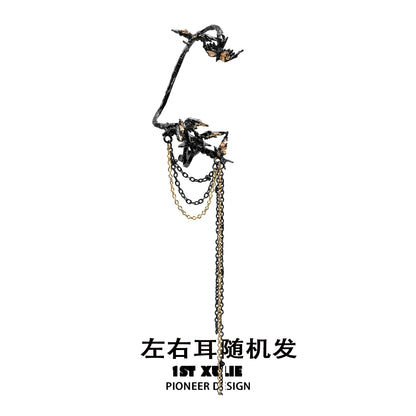 Unique swallow ear clips by 1STXULIE featuring intricate design and elegant chains