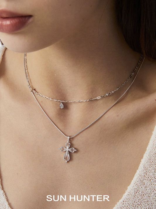 SUN HUNTER Teardrop Cross Necklace with Layered Silver Chains and Elegant Design
