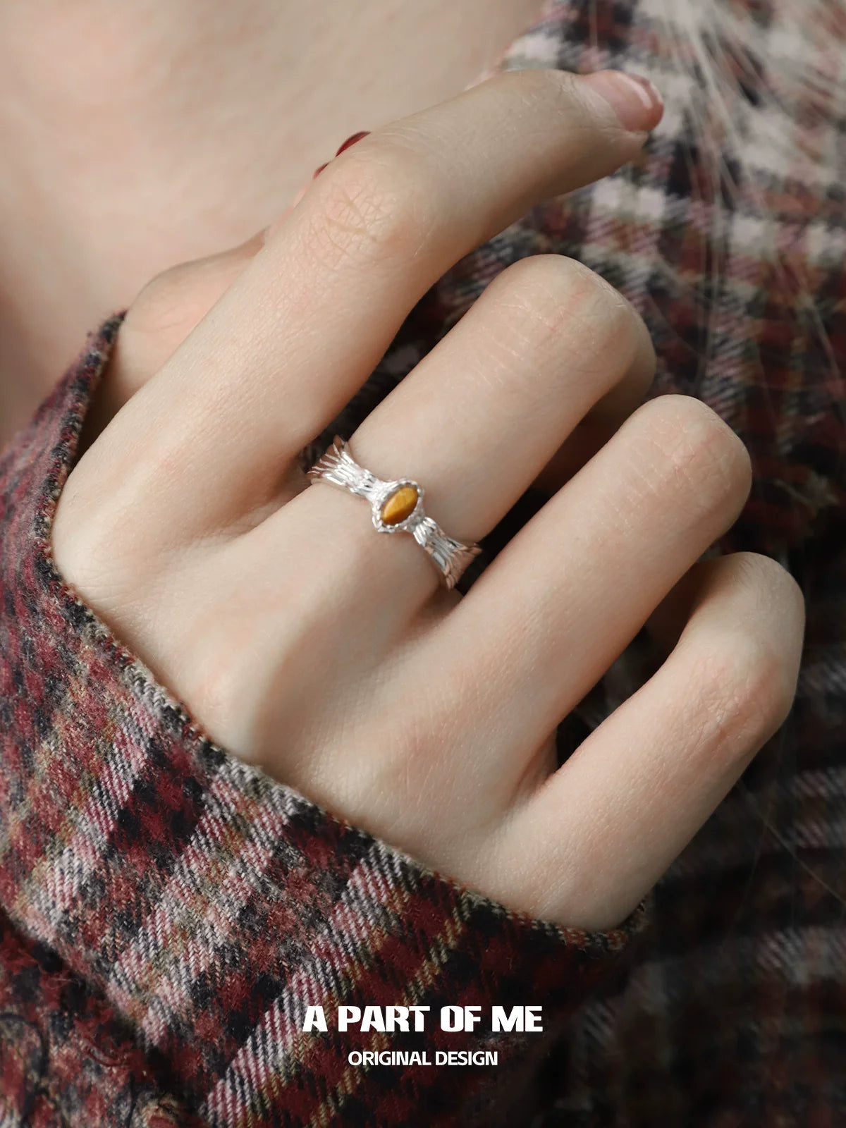 Elegant tiger eye ring for women with a unique design set on a textured silver band
