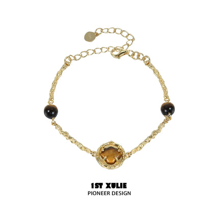 Elegant tiger eye shell silver bracelet with intricate design and adjustable chain for versatile wear