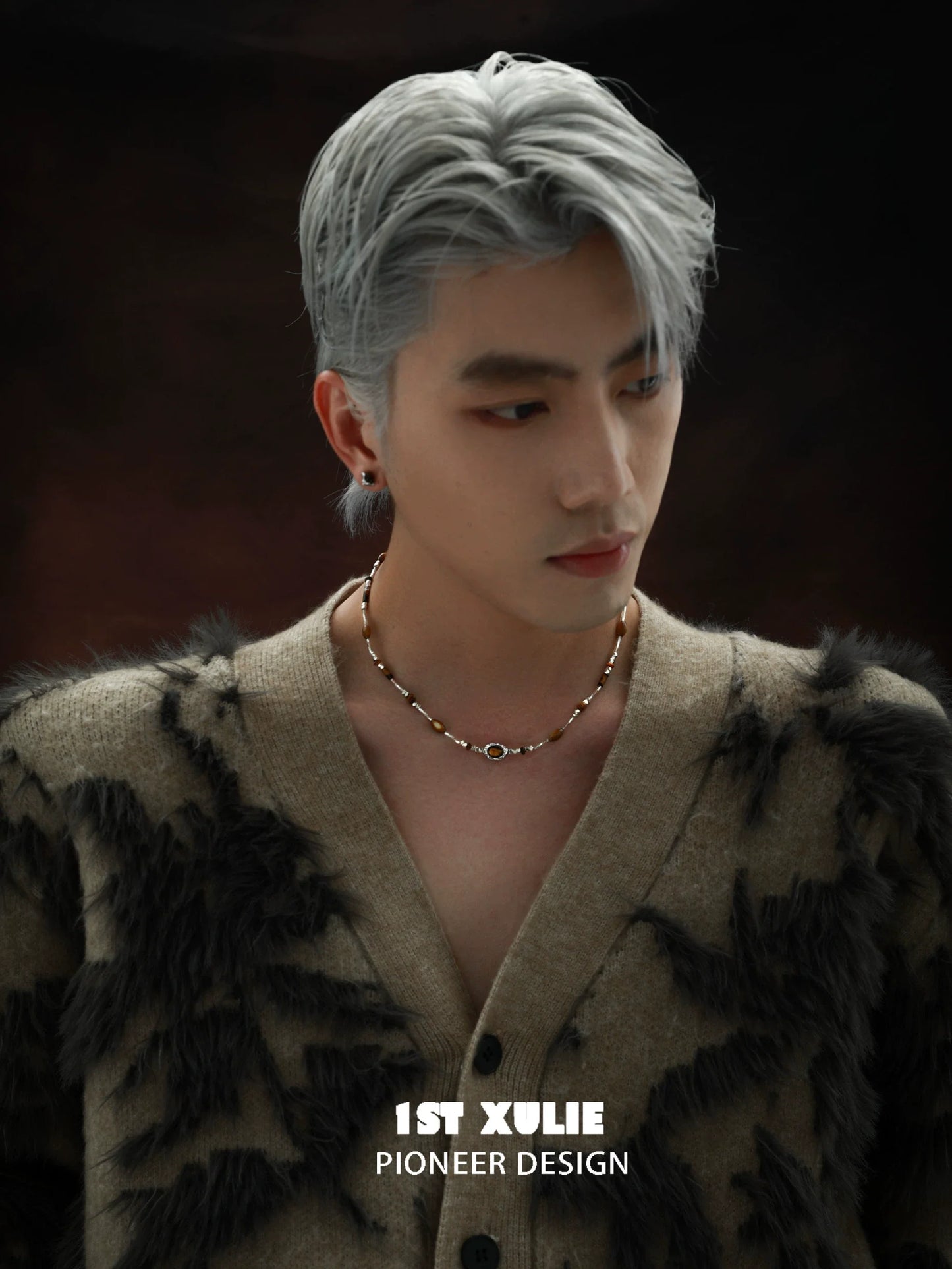 Stylish man wearing a tiger's eye necklace for women with unique design and natural stones