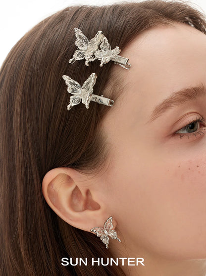 SUN HUNTER transparent butterfly earrings with sparkly details for a stylish accessory look